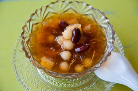 traditional chinese dessert : delicious bean and herb in longan syrupの写真素材