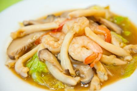 Stir-fried abalone with mix colorful vegetables and herbの写真素材