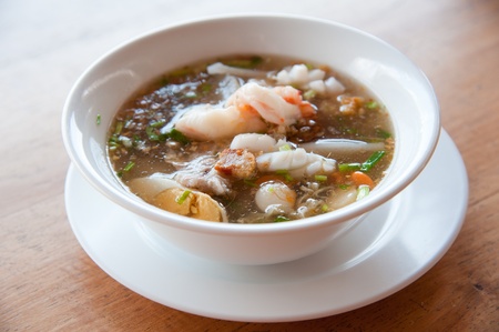 Sea food paste of rice flour  noodle  with egg, shrimp, mantis shrimp, squid and vegetables   delicious Thaiand and Vietnam foodの写真素材