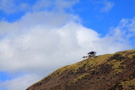 House in colorful leaf and blue sky in japan   Kouyouの写真素材