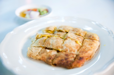 Crab Mataba  Kind of Muslim and Indian food made of flour with islamic dish that made of cucumber slices and onions in vinegar   Traditional Indian foodの写真素材