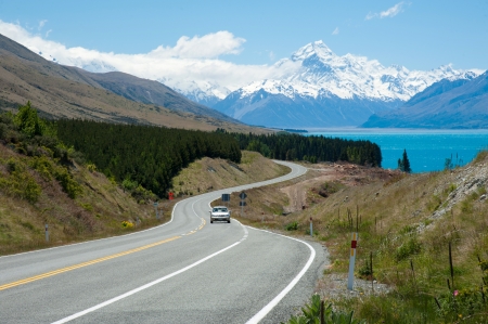 Beautiful landscape of road, lake and snow mountain in South Island, New Zealandの写真素材