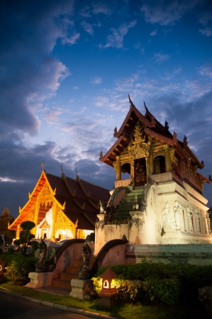 Beautiful temple and buddha with twilight sky   Wat Phra Sing Waramahavihan at Chiangmai Thailandの写真素材