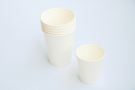 Group of white coffee cup made from cup stock paper on white backgroundの写真素材