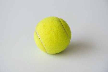 Tennis ball isolated on white backgroundの写真素材