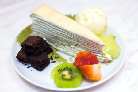 Uji Matcha Crepes Cake with vanilla ice cram, brownies and fruits topping