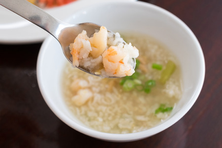 Traditional chinese porridge rice gruel in bowl, congee.の写真素材