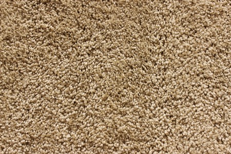 Fragment of material background a beige carpetの写真素材
