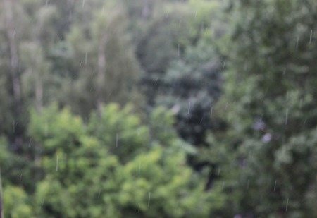 Drops of rain on black abstract background.の写真素材