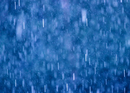 Drops of rain on blue abstract background.の写真素材