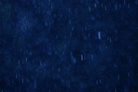 Drops of rain on blue abstract background.の写真素材