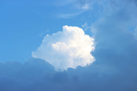 blue sky with white cumulus clouds