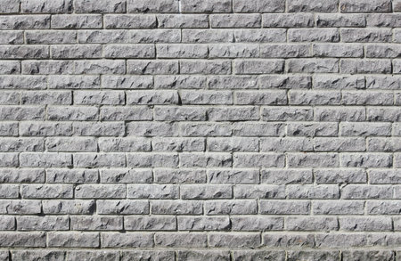 The modern wall of gray concrete tiles stone imitation