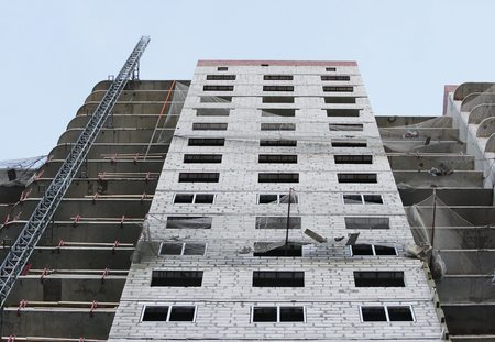 Protective catching grid net belay guard tense in the construction of a multistory newly building houseの写真素材