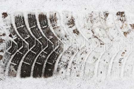trace of the tread on snow machinesの写真素材