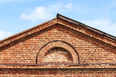 texture semi-circular window in the old historic brick buildingの写真素材
