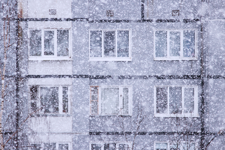 Falling snow flakes during the snowfall from the skyの写真素材
