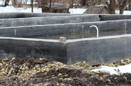 Shallow concrete foundation stone for the construction of houseの写真素材