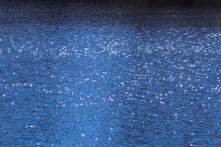 Water bokeh in the beauty lake in the parkの写真素材