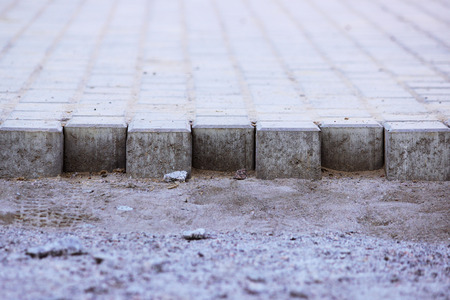 Repair of the sidewalk. Future car parking for tourist buses.の写真素材
