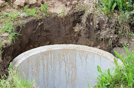 Well for water extraction. The construction of a village well for the extraction of water with the...