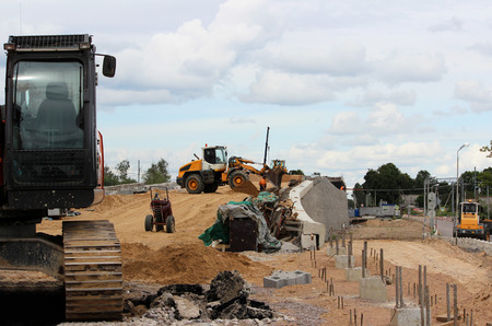 construction of a large road junction involving heavy equipment. Reportage shooting. Russia, the Leningrad Region.の写真素材