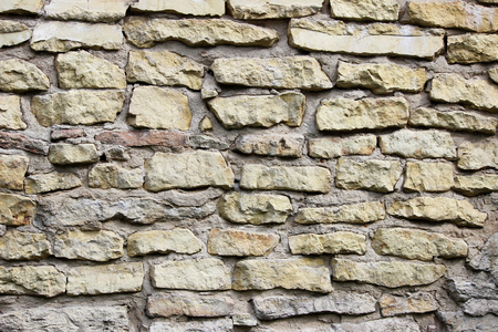 texture beige wall of historical stones calcareous tuff. Gatchina, Russia.の写真素材