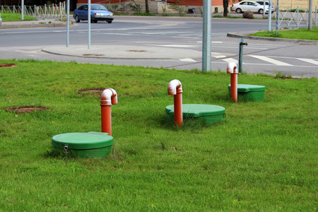 Tube of plastic tank gas oil catcher in the ground on the territory of the gas station, Russia.の写真素材