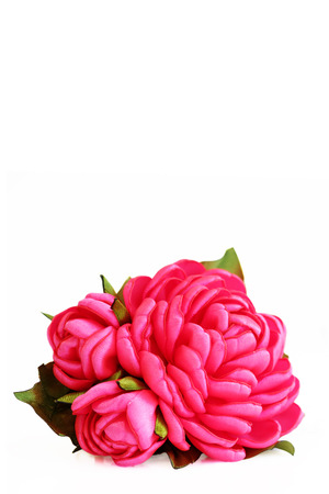 flower artificial handmade pink rose from satiny ribbons with buds on white background, isolated. vertical photoの写真素材