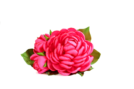 flower artificial handmade pink rose from satiny ribbons with buds on white background, isolated.の写真素材