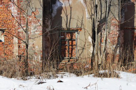 old brick ruins that remained from the historic house. a window embedded in bricks.の写真素材