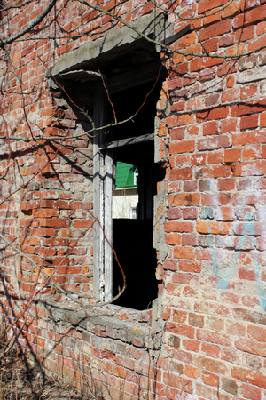 old brick ruins that remained from the historic house. empty windowの写真素材