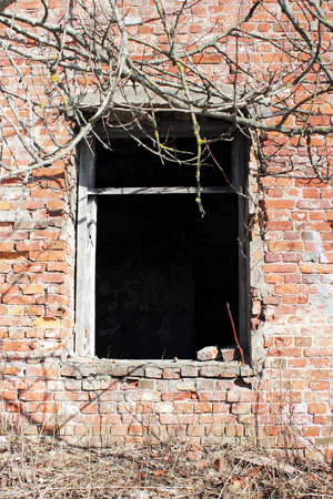 old brick ruins that remained from the historic house. empty windowの写真素材