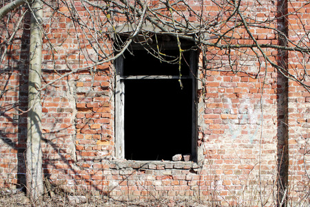 old brick ruins that remained from the historic house. empty windowの写真素材