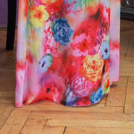 colorful summer dress the girl who stands on the parquet floorの写真素材