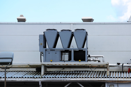 central air-conditioning system on the roof of a huge city shopping centerの写真素材