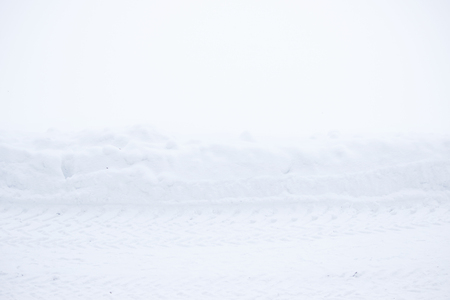 Winter landscape with snowfall and snowdrifts. snow removal in Gatchina Park.の写真素材