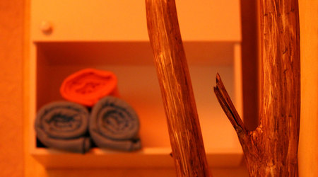 Three side blankets on the shelf in the massage room. wood as interior design.の写真素材