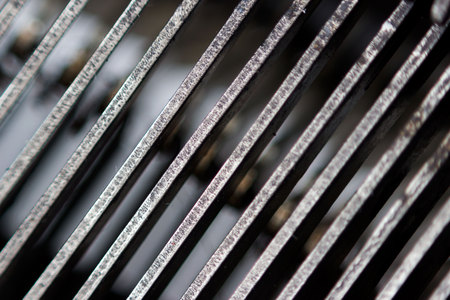 Hammers with letters, numbers and punctuation. Internal structure of the old Soviet typewriter close-up.の写真素材