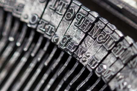 Hammers with letters, numbers and punctuation. Internal structure of the old Soviet typewriter close-up.の写真素材