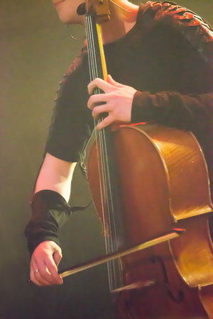 man musician with a cello on the stage. reportage.の写真素材