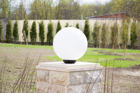 round lamps and planting juniper on the territory of the registry office for the marriage ceremony.の写真素材