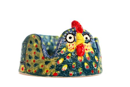 Colorful ceramic gift for Easter Chicken for painted eggs on a white background. Festive Easter chicken. Original bowl OOAK in a single copy.の写真素材