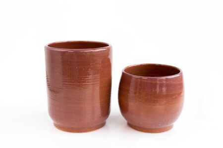 two decorative clay vases. Made by hand on a potter's wheel. In a single copy. On white background. Handmade, OOAK. Setの写真素材