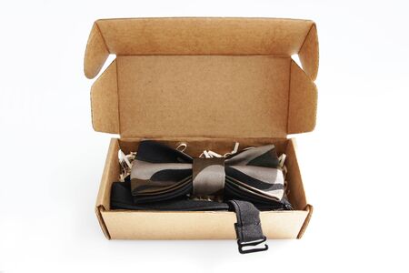 bow tie in a cardboard gift box. color khaki.の写真素材