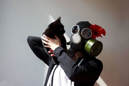 girl in gas mask with black cat. The Cat Lady. cosplayの写真素材