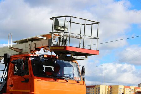 cradle and elevator on a machine for high-altitude work. construction and repair equipmentの写真素材