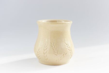 small vase with spikelets of beige clay covered with transparent glaze. gift for the day of the harvestの写真素材