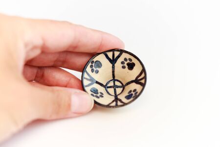 small children's dish with cat footprints. mini plate. author ceramics, all in one copyの写真素材