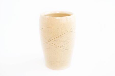 beige vase on a white background. minimalism style. interior decorationの写真素材